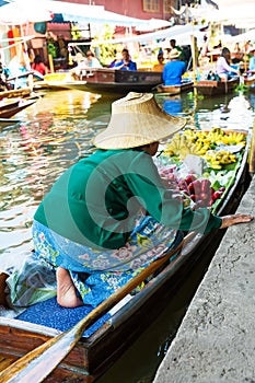 Traditional floating market in Damnoen Saduak near Bangkok. Thai photo