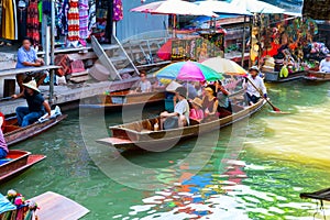 Traditional floating market in Damnoen Saduak near Bangkok photo