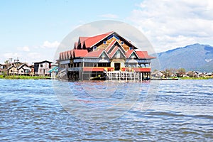 Traditional floating village houses in Inle Lake, Myanmar