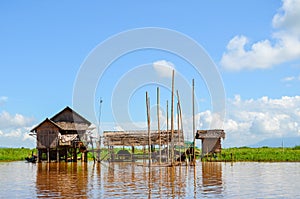 Traditional floating village houses in Inle Lake, Myanmar