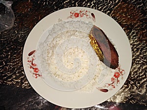 The traditional food of Bangladesh is Hilsa fish and white rice of Meghna river.