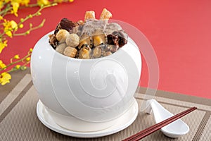 Traditional food of Chinese lunar new year, Buddha jumps over the wall, Chinese Soup Casserole dish, named Fo Tiao Qiang