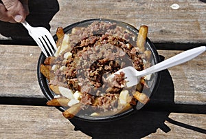 Montreal, 26th June: Smoked meat with patatoes plate from Vieux Port of Montreal in Canada photo