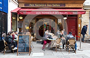A traditional French bistro Aux tonneaux des Halles at Montorgueil street in Paris, France.
