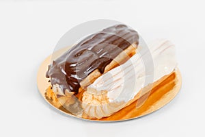 Traditional french eclairs with chocolate. Group of french dessert Eclair on white background. custard pastry dessert