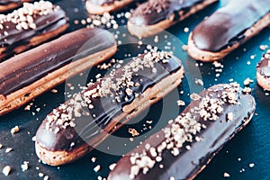 Traditional french eclairs with chocolate photo