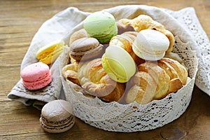 Traditional French pastries croissants and macaroons