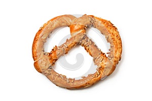 Traditional fresh German pretzel (Bretzel) with salt on white ba