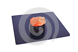 Traditional fresh japanese sushi on black stone gunkan ikura syake on a white background. Gunkan ingredients: salmon caviar,