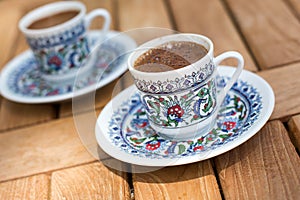 Traditional fresh turkish coffee on wooden table