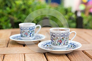 Traditional fresh turkish coffee on wooden table