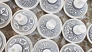 Traditional, freshly painted Moroccan pottery in Fes, Morocco.