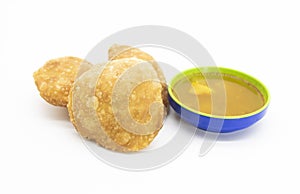traditional fried food puri or poori isolated on white baackground photo