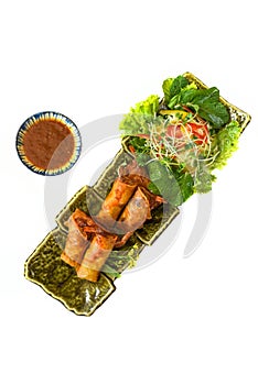 Traditional fried vietnamese spring rolls with pork, shrimp, rice paper isolated on white background top view