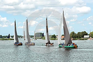 Traditional Frisian wooden sailing ships in a yearly competition