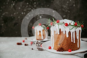 Traditional fruitcake for Christmas decorated with powdered sugar photo