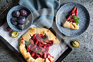 Traditional Galette pie filled with plums
