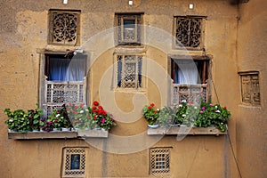 Traditional geometric windows in Masuleh village, Gilan province, Iran photo