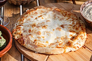 Traditional Georgian bread with cheese - khachapuri