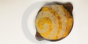 Traditional Georgian bread - khachapuri served over white. Homemade baking. Top view. Flat lay, overhead