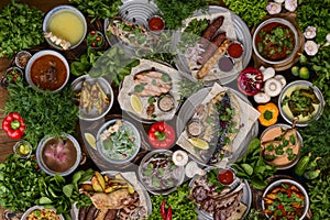 Traditional Georgian cuisine. Matzoon Okroshka, Khash Chikhirtma Harcho Soup. Celebration, party table.