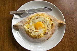 Traditional Georgian Khachapuri cheese pie with egg
