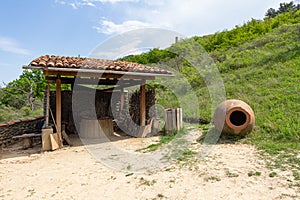 Traditional Georgian wooden structure for wine production in Tbilisi Open Air Museum of Ethnography. Georgia country