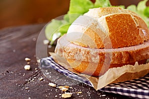 Traditional German meat loaf on a fresh crisp roll