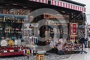 Traditional gift shops in historical center of Sarajevo, Bascarsija. Shopping bosnian souvenirs in Sarajevo old town