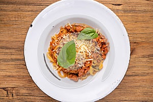 Traditional gourmet pasta flat lay. Overhead view of a plate of pasta with delicious sauce. Italian food concept.