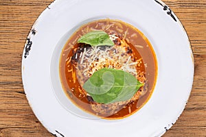 Traditional gourmet pasta flat lay. Overhead view of a plate of pasta with delicious sauce. Italian food concept.