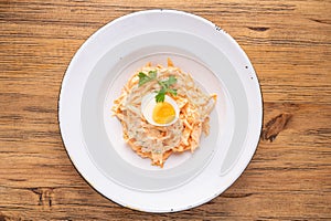 Traditional gourmet pasta flat lay. Overhead view of a plate of pasta with delicious sauce. Italian food concept.