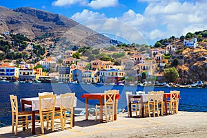 Traditional Greece - small street tavernas in Symi island, Dodecanesse photo