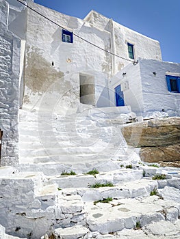Traditional greek architecture, Stairs,  whitewashed walls and blue doors at Kastro village