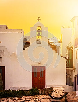 Traditional greek church at sunset