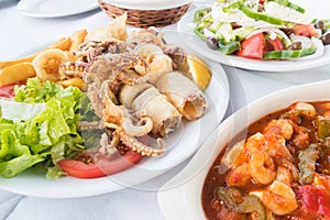 Traditional Greek Food Served At Outdoor Restaurant photo