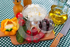 Traditional Greek fresh vegetable salad with feta cheese and herbs