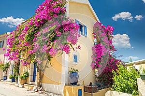 Traditional greek house with flowers in Assos, Kefalonia island, Greece.