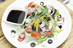 Traditional greek salad with feta cheese and mixed organic veget