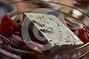 Traditional Greek salad with vegetables, olives and feta cheese