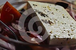 Traditional Greek salad with vegetables, olives and feta cheese