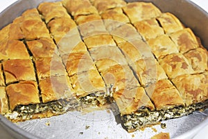 Traditional greek spanakopita - spinach pie with the greek cheese feta