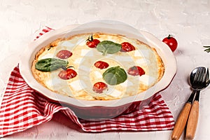 Traditional greek spinach pie. Pie Spanakopita with Spinach and Cheese. Delicious snack on a light background, top view