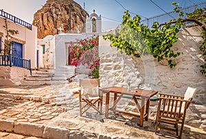 Traditional Greek street in town centre at sunset time, Amorgos Island, Greece.