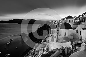 Traditional greek village of Oia in black and white, Santorini island, Greece.