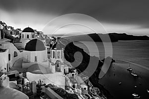 Traditional greek village of Oia in black and white, Santorini island, Greece.