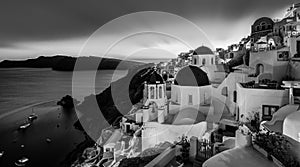 Traditional greek village of Oia in black and white, Santorini island, Greece.