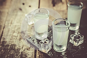 Traditional greek vodka - ouzo in shot glasses