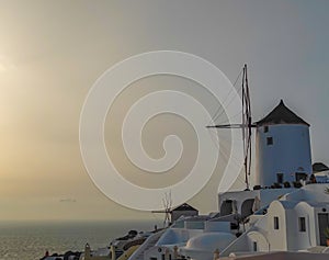 Traditional Greek windmill in Oia village on Santorini island, Greece
