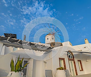 Traditional Greek windmill in Oia village on Santorini island, Greece